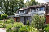 Frontansicht Haus links - 3 Zimmer Terrassenwohnung zum Kaufen in Undeloh