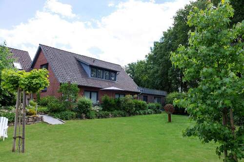Gartenansicht - 3 Zimmer Terrassenwohnung in Undeloh
