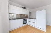 Küche mit Markengeräten - Etagenwohnung mit 87,10 m² in München zum Kaufen