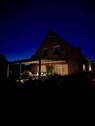 Hausansicht im Dunkeln - 5 Zimmer Einfamilienhaus zum Kaufen in Bunde