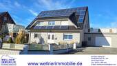 www.wellnerimmobilie.de_Titel.jpg - MIT BLICK AUF FREIES FELD UND MITTELLANDKANAL! Wohnhaus mit Einliegerwohnung und Garage in Bad Essen-Wimmer!