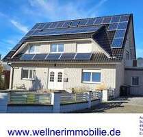 MIT BLICK AUF FREIES FELD UND MITTELLANDKANAL! Wohnhaus mit Einliegerwohnung und Garage in Bad Essen-Wimmer!