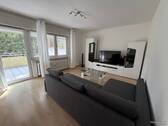 Wohnzimmer - Wohnung rechts - 2 Zimmer Etagenwohnung zum Kaufen in Heusenstamm