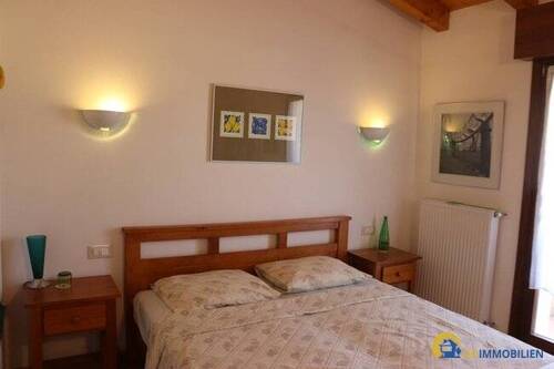 AD Immobilien Schlafzimmer - 