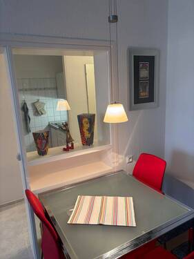 Durchreiche Küche zum Essplatz - 2 Zimmer Etagenwohnung in Kellenhusen