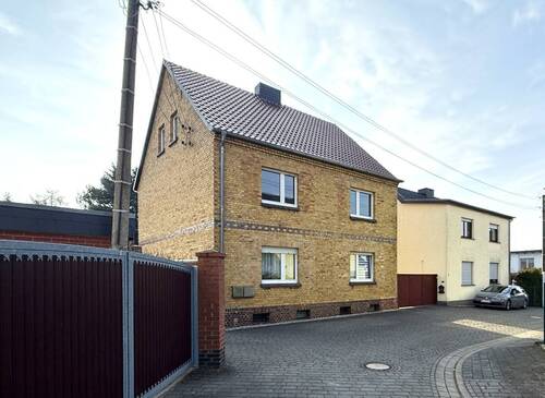 Westansicht - Mehrfamilienhaus, Wohnhaus mit 139,40 m&sup2; in Muldestausee zum Kaufen