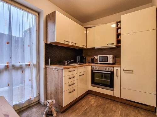 Küche mit Einbauküche - 