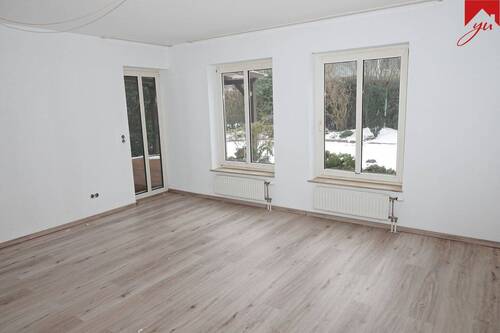 Wohnzimmer mit Zugang zur Terrasse - Etagenwohnung mit 69,40 m&sup2; in Wittmund zum Kaufen