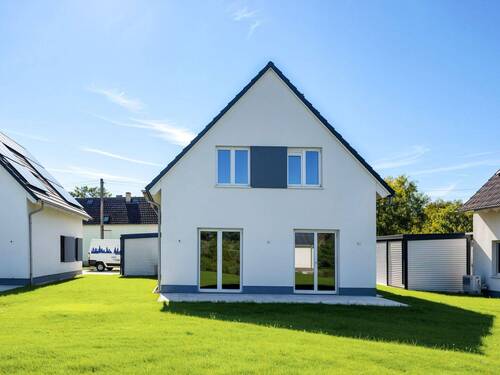 Haus mit Terrasse und Garten - 