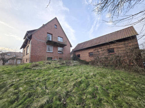 Bild1 - Grundstück mit Weserblick und aufstehendem Abrissgebäude in Pet.-Ovenstädt