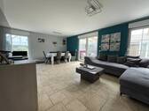 Wohnzimmer mit Ausgang zum Wintergarten - 