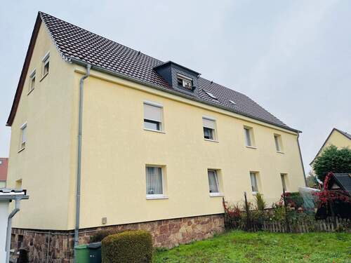 Hausansicht hinten - 3 Zimmer Etagenwohnung zum Kaufen in Mügeln