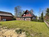 Straßenansicht - Mehrfamilienhaus, Wohnhaus mit 93,00 m&sup2; in Fintel zum Kaufen