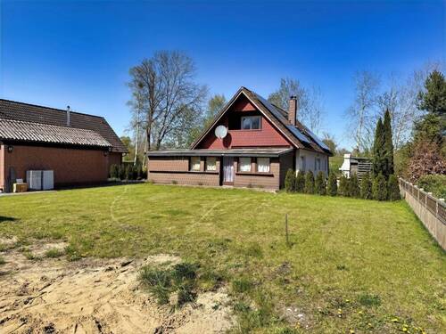 Straßenansicht - Mehrfamilienhaus, Wohnhaus mit 93,00 m&sup2; in Fintel zum Kaufen