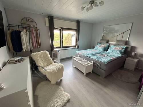 Schlafzimmer - Einfamilienhaus mit 136,00 m&sup2; in Niederhausen an der Appel zum Kaufen