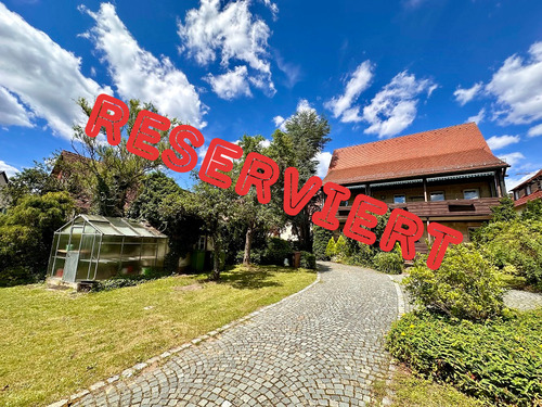 Titelbild - 830m² Grund mit großem 2-3 Familienhaus im Herzen von Rückersdorf