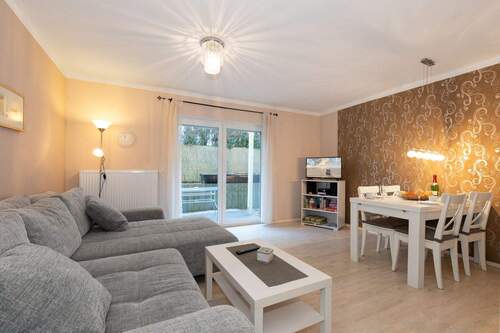 Der gemütliche Wohn- Essbereich mit Terrasse - 