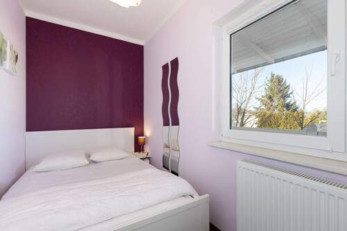 Das gemütliche Schlafzimmer im Obergeschoss - 