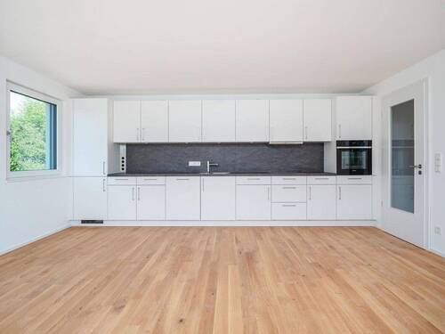 Wohnraum mit EBK - Etagenwohnung mit 56,70 m&sup2; in Parsdorf zum Kaufen