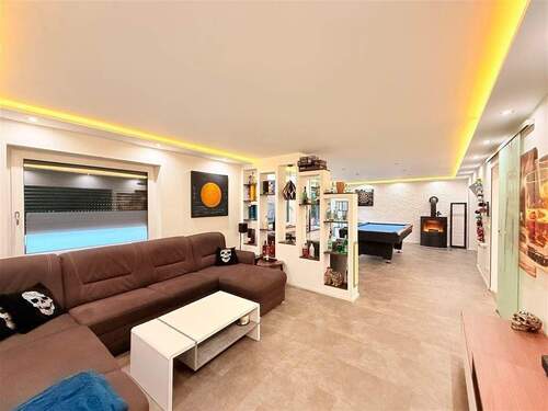 Wohnzimmer mit Kamin - 