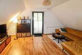 Wohnzimmer ELW mit Loggia-Zugang - 