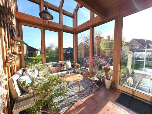 Sitzecke Wintergarten - 5 Zimmer Einfamilienhaus zum Kaufen in Appen