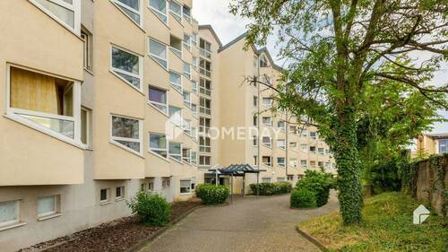 Außenansicht 4 - Gepflegte 2-Zimmer-Wohnung in Rüsselsheim mit Aufzug und Top-Lage