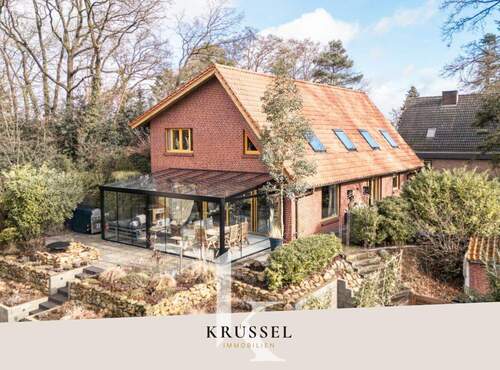 Herzlich willkommen bei KRÜSSEL IMMOBILIEN - ANFRAGESTOPP: Lichtkunst & Lebensqualität - Exklusives Architektenhaus in Lingen!