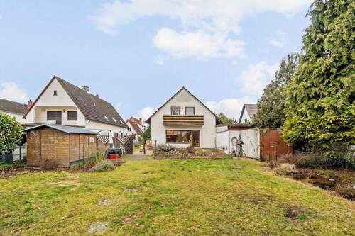Gartenblick - 8 Zimmer Mehrfamilienhaus, Wohnhaus zum Kaufen in Rüsselsheim