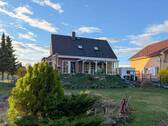 Titelbild - Freistehendes Einfamilienhaus mit idyllischem Grundstück und vielseitigem Untergeschoss