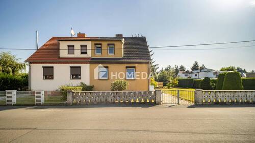 Außenansicht 1 - Familienfreundliche DHH mit großem Garten, Garage und Entwicklungschancen