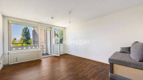 Wohnzimmer 1 - Ideal geschnittene Singlewohnung mit Westloggia im gepflegten Mehrfamilienhaus