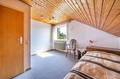 Schlafzimmer im Dachgeschoss - 
