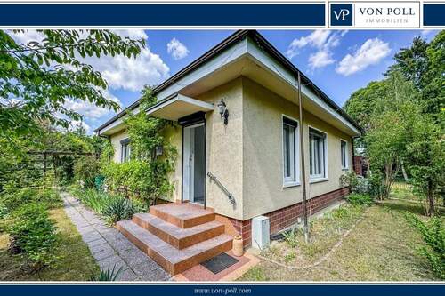 Titel - Charmantes Einfamilienhaus mit großem Garten und viel Gestaltungspotenzial in ruhiger Wohnlage