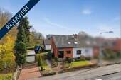 Reserviert - Vielversprechendes Einfamilienhaus mit Garage, Garten und Gestaltungsspielraum