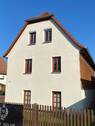 Außenansicht - Mehrfamilienhaus, Wohnhaus mit 157,30 m&sup2; in Riesa zum Kaufen