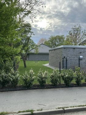 Ansicht Garage Haus Garten - Bungalow mit 100,00 m&sup2; in Fehmarn zum Kaufen