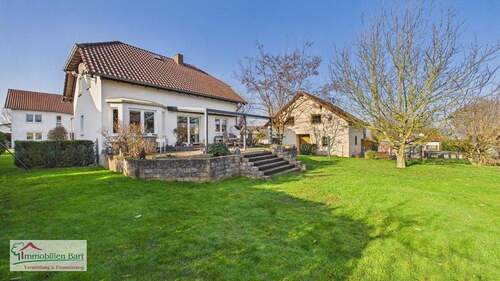 Terrasse mit Zugang zum Garten - 