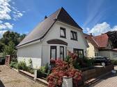 Straßenansicht - 1 Zimmer Mehrfamilienhaus, Wohnhaus zum Kaufen in Sörup