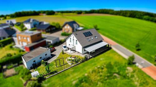 Rückansicht Luftbild - 6 Zimmer Einfamilienhaus in Eggermühlen