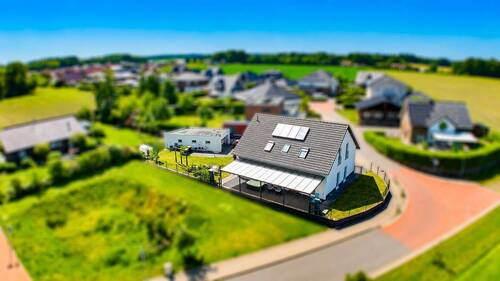 Wohnsiedlung in Eggermühlen - Einfamilienhaus mit 202,70 m&sup2; in Eggermühlen zum Kaufen