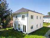 Hausansicht - Erstbezug: Modernes Einfamilienhaus mit großzügigem Grundstück