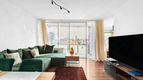 Wohnzimmer 1 - Helle 2-Zimmer-Wohnung mit Loggia und Aufzug in gefragter Lage von Eppelheim