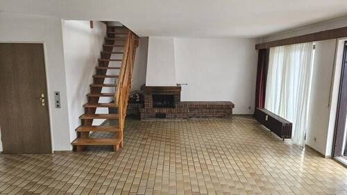 Wohnzimmer im OG mit Zugang zum DG - 