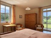 Schlafzimmer 1 im Erdgeschoss - 