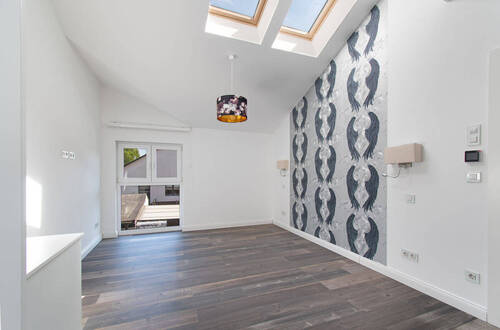 Schlafzimmer mit Dachfenstern im Hinterhaus - 