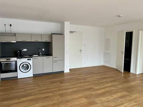 Wohnbereich mit offener Küche - 2 Zimmer Terrassenwohnung in Fürth