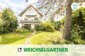 Im Alleinauftrag - Eigentumswohnung mit herrlichem West-Garten, extra Hobbykeller und zwei Garagen