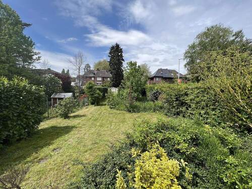 Garten (Bild aus 2023) - Doppelhaushälfte mit 95,00 m&sup2; in Mönchengladbach-Wickrath zum Kaufen