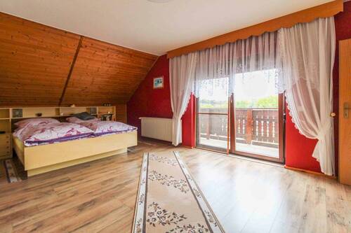 Schlafzimmer mit Balkon - 